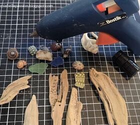 She added a dab of hot glue to some seashells and driftwood to make her kitchen look exquisite