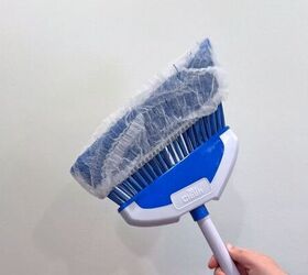Clever way to keep broom bristles clean while sweeping floors