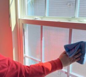 Cleaning windows with peppermint oil and dish soap to help repel bugs