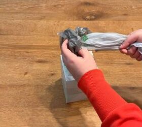 how to organize plastic bags with a tissue box hack, Space saving plastic bag organizer using recycled tissue box
