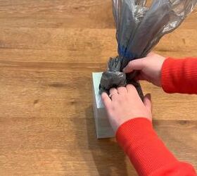 how to organize plastic bags with a tissue box hack, How to reuse plastic grocery bags for easy access storage