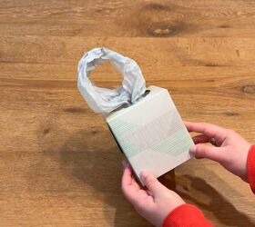 how to organize plastic bags with a tissue box hack, Step by step method to fold and store plastic bags in a box