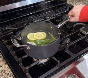 Natural homemade spider repellent using fresh rosemary and lemon slices