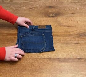 Upcycled jeans wall decor idea with built-in storage pocket and loop 