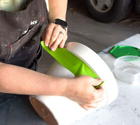 Put a piece of tape on a terracotta planter for an outdoor decor idea we haven't seen before