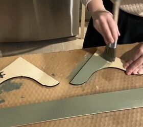 Apply paint and primer to trim and corbels