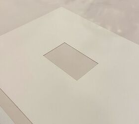 Flip a piece of scrap wallpaper like this to give basic picture frames a serious upgrade