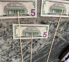 She taped 5-dollar bills to wooden skewers for a really fun gift idea