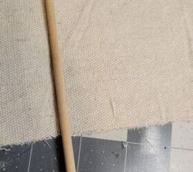 She places a wooden dowel over some scrap fabric for this gorgeously patriotic tablescape