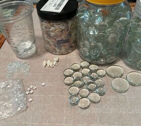 Use seashells and glass gems to add more beachy summer vibes to your home