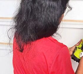 She used the space behind her door for this GENIUS storage hack