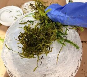 She pressed moss on decorative balls to give her home an instant spring-time refresh