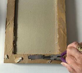 She flipped a vintage picture frame upside down for this useful and elegant upcycle