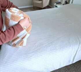Space saving blanket storage idea that doubles as decor 