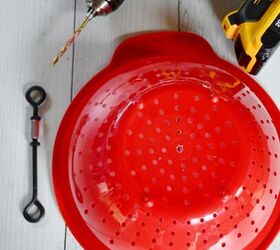 Drill a hole through a collander for an outdoor hack birdwatchers are going to LOVE