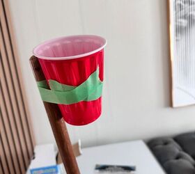 Stick a plastic cup to a broomstick for this clever party decoration hack 🎈