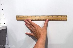 She measured the inside of her kitchen cabinet for this cute and handy idea
