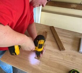 how to turn an old desk into an extra large diy craft desk, Lining up braces and pre drilling holes