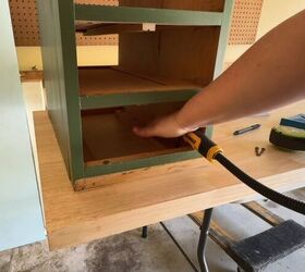how to turn an old desk into an extra large diy craft desk, Attaching cabinets to desktop