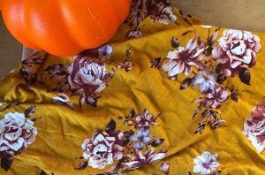 Use fabric scraps to make little styrofoam pumpkins so much more elegant