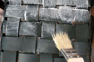 Brush Mod Podge on an old wicker basket to give it a new-and-improved look