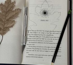 She traces a leaf over a book page for elegant $0 decor