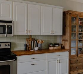 how i modified a vintage dresser into a functional kitchen cabinet , Add warmth to a White Kitchen with Wood Storage Pantry