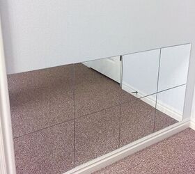 Watch how a bunch of square mirrors can dramatically improve a blank wall (in more ways than 1!)