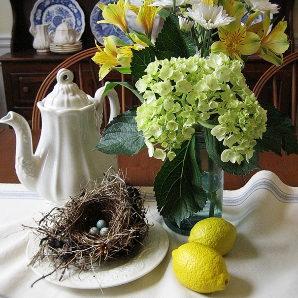 mason jars and bird nests a simple summer centerpiece, home decor, seasonal holiday decor, My favorite colors blue and yellow combine to create a simple summery centerpiece