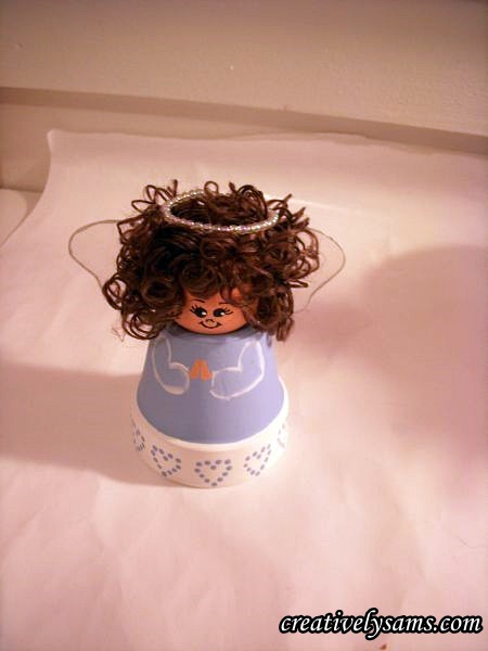flower pot angel, crafts, Glue on wings to back of angel Add halo to top of hair