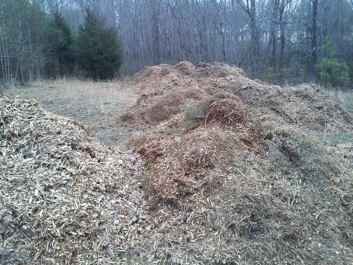 mulch piles during all the work for me, gardening, go green, the piles are begining to add up