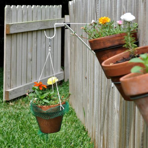 repurpose a mesh produce bag into a hanging flower pot, flowers, gardening, outdoor living, repurposing upcycling