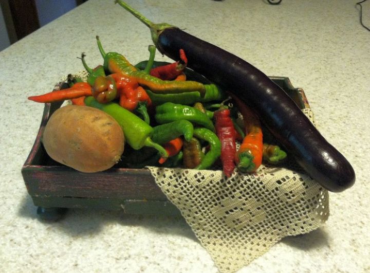 farmers market bounty in a rustic tray, crafts, Add a vintage doily and have an eatable centerpiece of sweet peppers and eggplant and sweet potatoes I also have onions that I didn t want to put in same container