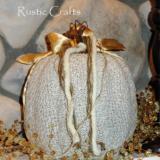 recycled sweater pumpkin craft, crafts, repurposing upcycling, The finished pumpkin with some warm gold embellishments