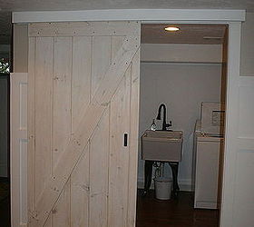 Walk In Closet with Plank Barn Door on Rails - Cottage - Closet