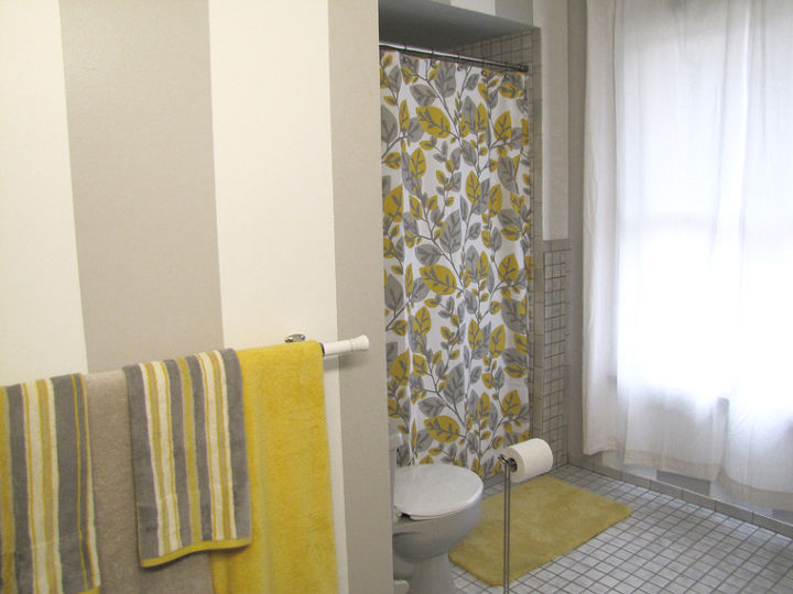 guest bathroom before and after, bathroom ideas, home decor, When we finally added our d cor we decided on a yellow and gray theme