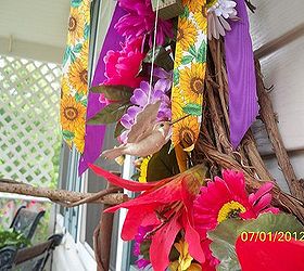 summer grape vine wreath one of my summer decorations on my front porch, crafts, seasonal holiday decor, wreaths, OF COURSE THERE S GOING TO BE A CURIOUS HUMMER CHECKING OUT ALL THE FLOWERS