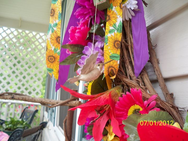 summer grape vine wreath one of my summer decorations on my front porch, crafts, seasonal holiday decor, wreaths, OF COURSE THERE S GOING TO BE A CURIOUS HUMMER CHECKING OUT ALL THE FLOWERS