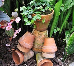 making the most of a small patio, flowers, gardening, hydrangea, outdoor living, repurposing upcycling, My little rustic flower pot man tutorial on my blog