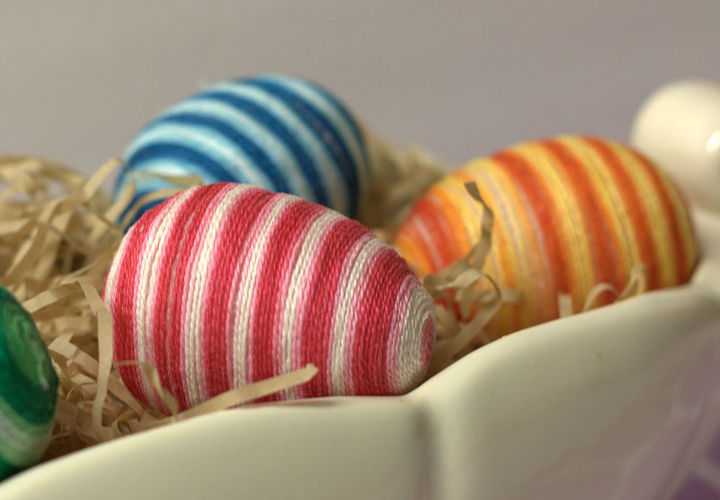 striped easter eggs, crafts, easter decorations, seasonal holiday decor, The stripes on the eggs are formed not with individual colors of floss but with one skein of friendship bracelet string