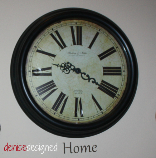 a wall of clocks, home decor, This is the largest clock and the center of it all home