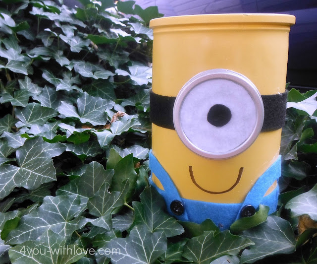 diy minion storage crock, crafts, Glue on your pieces and embelish