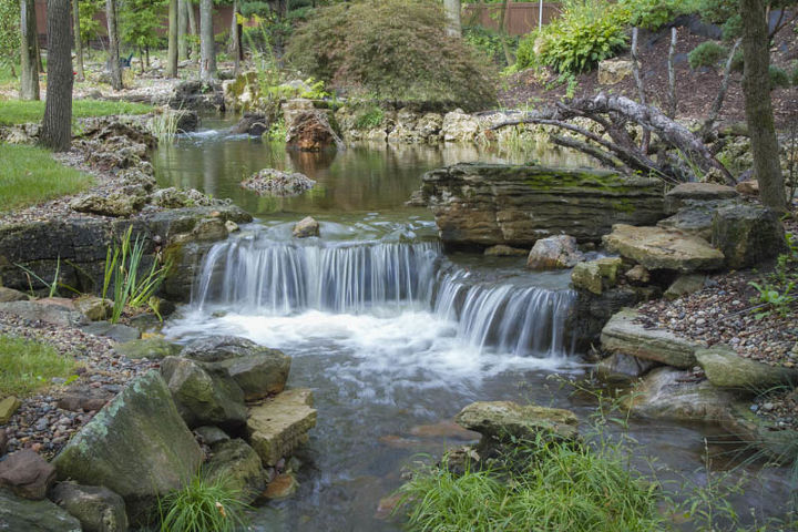 expansive waterfalls and pond in crown point indiana, outdoor living, patio, ponds water features, A close up of one of the many waterfalls A variety of stone was used in this project