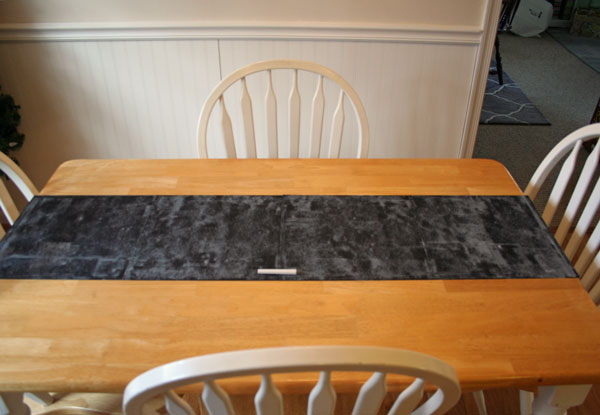 diy valentine s day table, painted furniture, seasonal holiday decor, valentines day ideas, Prime the runner by rubbing chalk all over it This way your first words will wipe away