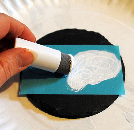 make some faux chalk art coasters, chalk paint, crafts, Step 2 Using a foam pouncer apply the paint over the silkscreen and onto the slate tile