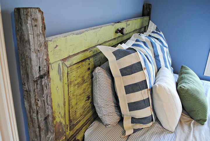 vintage door headboard, doors, repurposing upcycling, I love that the fenceposts are original to our farm They were here long before we were and now they re getting a new life instead of going to the trash pile