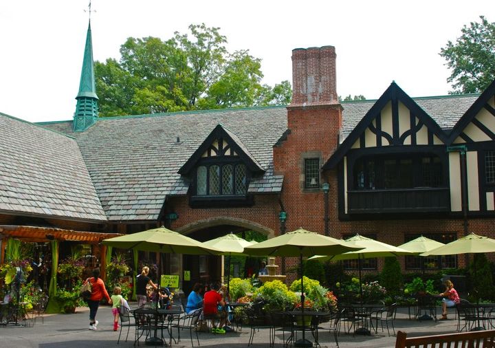 stan hywet s great garden part 2 the cutting garden, flowers, gardening, landscape, The Carriage House was once the ten car garage stable and living quarters for the chauffeur and groomsmen Now it serves as a visitor center for purchasing tickets buying a light lunch in the cafe or browsing their garden shop