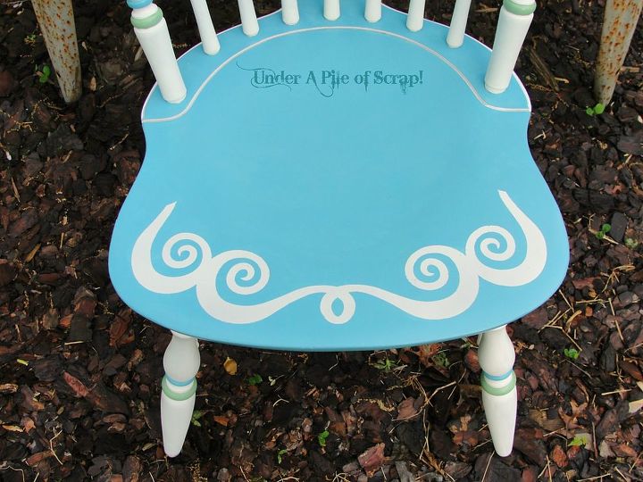 pretty painted garden chair, outdoor furniture, outdoor living, painted furniture, Whimsical design stenciled on seat edge Didn t want to cover a design if I chose to sit a plant or water can on seat so I left it blank