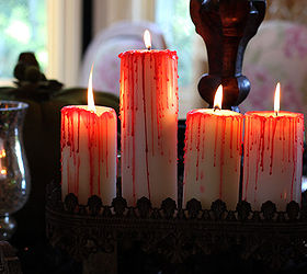 5 frightfully fast halloween decorations, halloween decorations, seasonal holiday d cor, Cast a creepy glow over any room with this twist on regular candles With a little red wax you can give the illusion that your candlesticks are dripping blood
