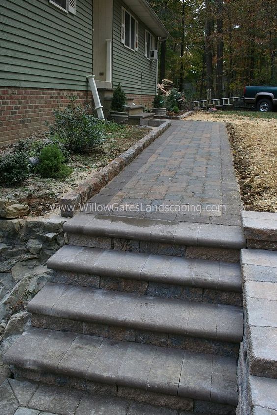 narvon walkway, concrete masonry, landscape, Techo Bloc Belgik curbstone was installed between the flowerbed and walkway On the other side of the front steps the line is continued to separate the flowerbed and lawn